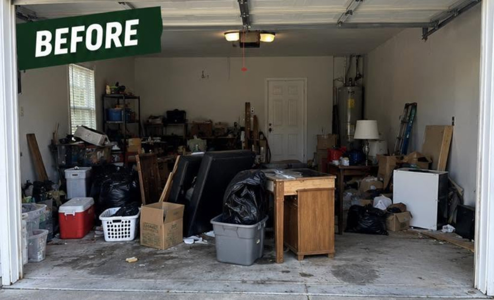Cluttered two-car garage before a garage cleanout in Fort Wayne, Indiana
